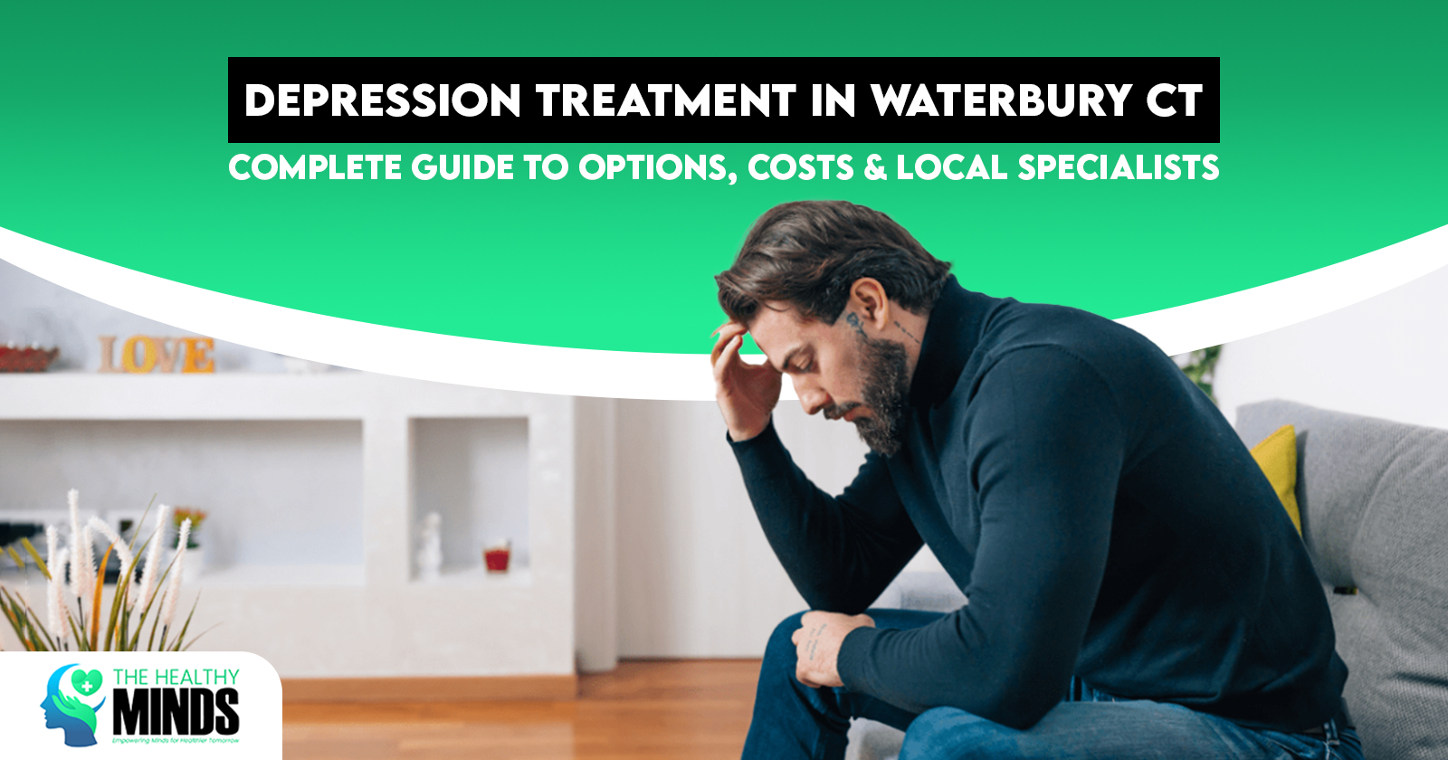 Depression Treatment in Waterbury CT: Complete Guide to Options, Costs & Local Specialists 2 Man sitting on couch with head in hand, representing struggle with mental health, used in article about depression treatment in Waterbury CT guide to options, costs, and local specialists.